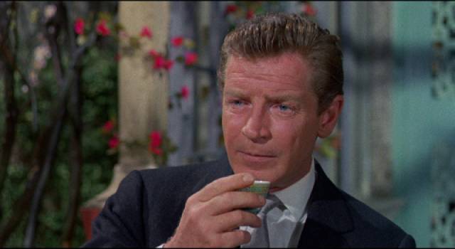Don Benton (Richard Basehart), travel agent turned spy in Michael Carreras' Visa to Canton (1960)