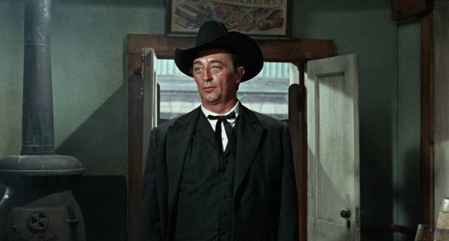 The new preacher in town (Robert Mitchum) has more than religion on his mind in Henry Hathaway's 5 Card Stud (1968)