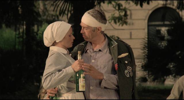 Corporal Steiner (James Coburn) enjoys a brief interlude with a nurse (Senta Berger) as he recuperates from his wounds in Sam Peckinpah's Cross of Iron (1977)