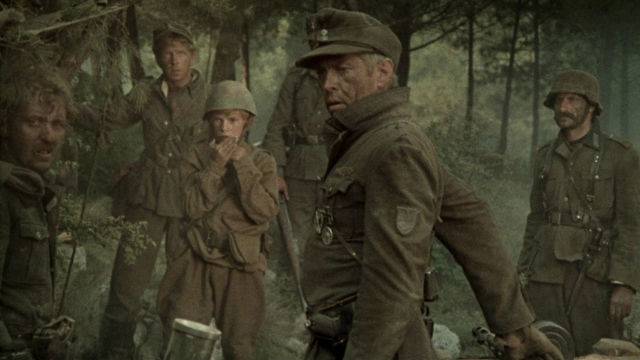Corporal Steiner (James Coburn) does his best to protect his men in Sam Peckinpah's Cross of Iron (1977)