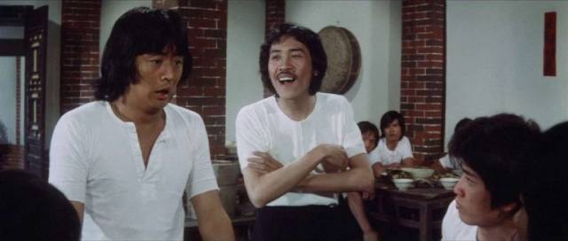 Fellow students mock Ah Pao (Li Yi-Min) for his lack of training in Joseph Kuo's The Mystery of Chess Boxing (1979)