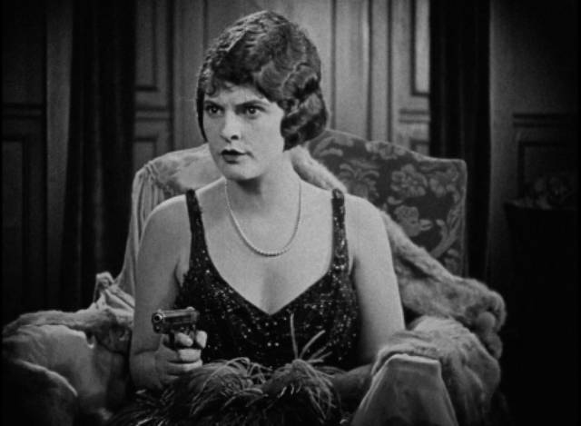 Molly (Priscilla Dean) becomes tough and cynical when her father is framed for murder in Tod Browning's Outside the Law (1920)
