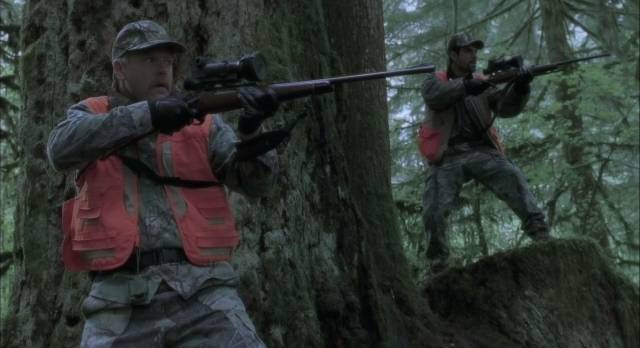 Hunters use high-tech weapons to slaughter wildlife in William Friedkin's The Hunted (2003)