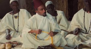 Imam (Alioune Fall) uses the unshakable authority of his religion to take control of the community in Ousmane Sembène's Ceddo (1977)