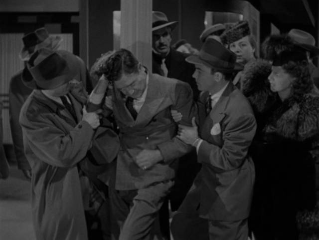 William Everest (Richard Dix) loses his memory when struck by a car in Lew Landers' The Power of the Whistler (1945)