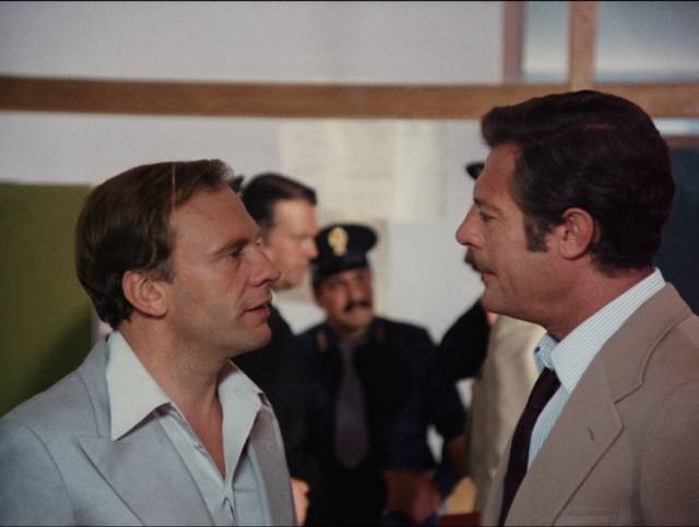 Massimo Campi (Jean-Louis Trintignant) chats with Commissioner Salvatore Santamaria (Marcello Mastroianni) in Luigi Comencini’s The Sunday Woman (1975)