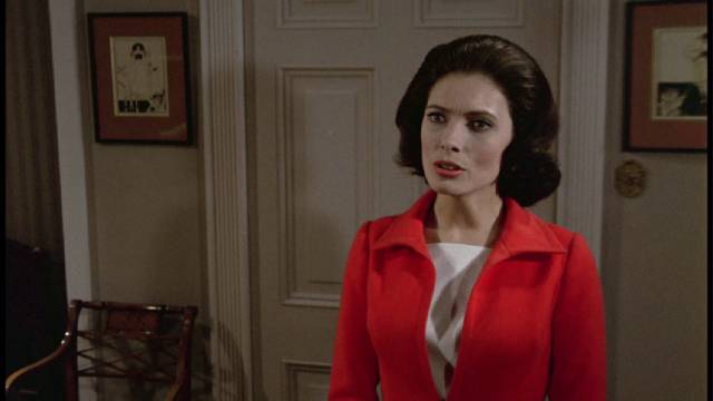 Eve (Hildegard Neil) is disturbed by the changes in her husband in Basil Dearden's The Man Who Haunted Himself (1970)