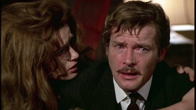 Pelham (Roger Moore ) becomes desperate as he sees his life slipping away in Basil Dearden's The Man Who Haunted Himself (1970)