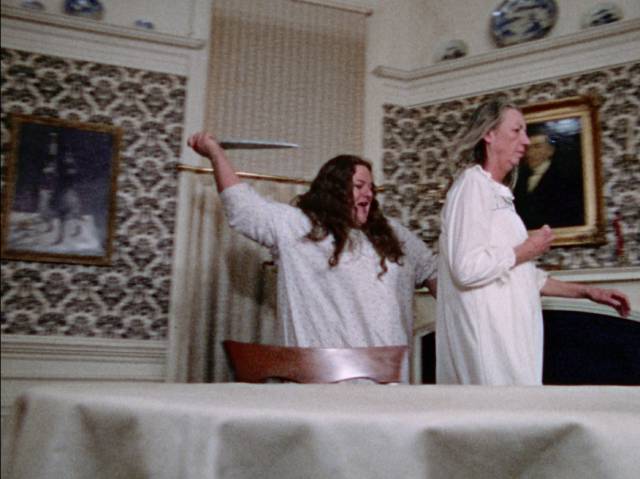 Ethel Janowski (Priscilla Alden) doesn't take it well when Grandma (Jane Lambert) locks the fridge in Nick Millard's Criminally Insane (1975)