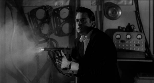 Johnny Cabot (Johnny Cash) kills some cops during a robbery in Bill Karn’s Door-to-Door Maniac (1961)