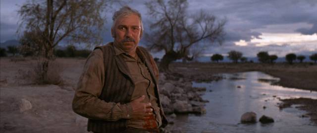 Sheriff Cullen Baker (Slim Pickens) calmly accepts his own death in Sam Peckinpah’s Pat Garrett and Billy the Kid (1973)