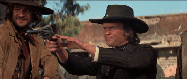 Billy (Kris Kristofferson) and his friends amuse themselves by shooting chickens in Sam Peckinpah’s Pat Garrett and Billy the Kid (1973)