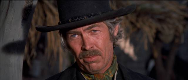 Pat Garrett (James Coburn) is saddened to realize he's going to have to kill his friend in Sam Peckinpah’s Pat Garrett and Billy the Kid (1973)