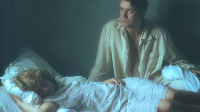 A pair of resistance fighters hiding as a married couple fall in love in István Szabó's Confidence (1980)