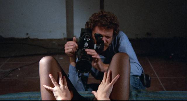 Cameraman Mark (Christopher Augustine) treats his job in porn with dispassionate professionalism in Christina Hornisher's Hollywood 90028 (1973)