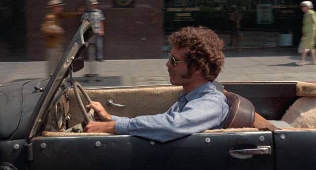 Mark (Christopher Augustine) drives the streets of L.A. in a modified VW convertible in Christina Hornisher's Hollywood 90028 (1973)