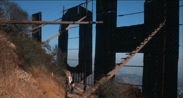 Rundown and decaying, the Hollywood sign belies the town's image of glamour in Christina Hornisher’s Hollywood 90028 (1973)