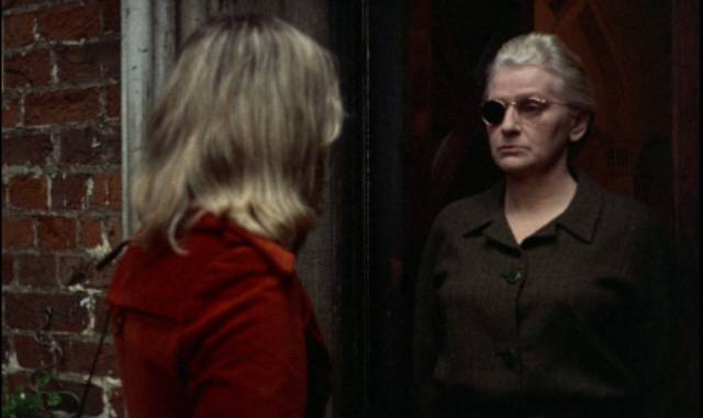 Miss Brabazon (Sheila Keith) dislikes young lady visitors in Pete Walker's House of Mortal Sin (1976)