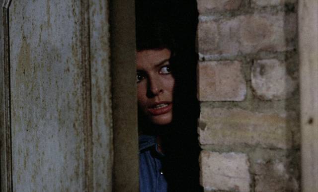 Julia (Ann Michelle) tries desperately to escape in Pete Walker's House of Whipcord (1974)