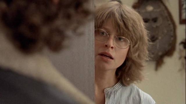 Academic Jill Cowper (Judy Morris) develops full-blown paranoia when working-class Max (Ivar Kants) intrudes into her home in Peter Weir's The Plumber (1979)