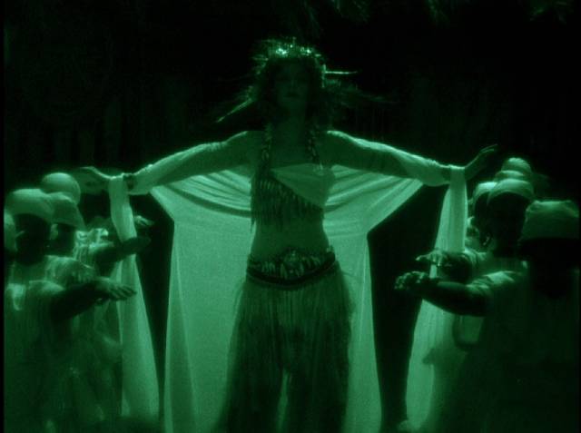 Silent-style tinting adds atmosphere to a voodoo ceremony in Roy William Neill's Black Moon (1934