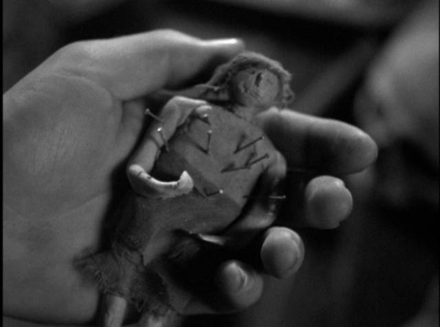 The inevitable discovery of a voodoo doll in Roy William Neill's Black Moon (1934)