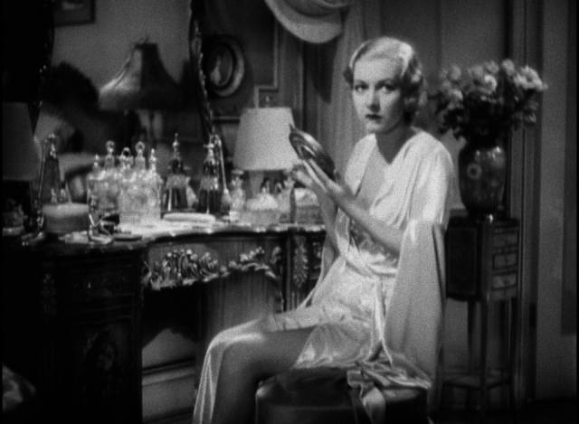 Poppy (Karen Morley) is initially unimpressed with Tony Camonte (Paul Muni)'s crude style in Howard Hawks' Scarface (1932)