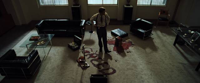 Detective Mills (Brad Pitt) tries to interpret a killer's cryptic messages in David Fincher's Se7en (1995)