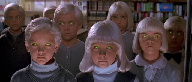 Alien children pose a threat to a small California town in John Carpenter's remake of Village of the Damned (1995)