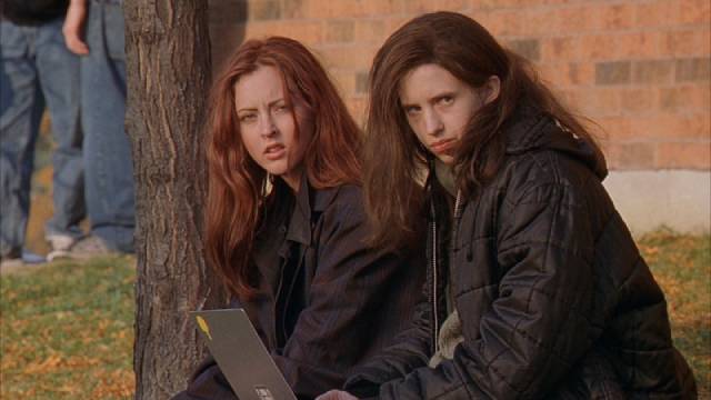 The alienation of sisters Ginger (Katharine Isabelle) and Bridget (Emily Perkins) manifests in horrifying ways in John Fawcett's Ginger Snaps (2000)