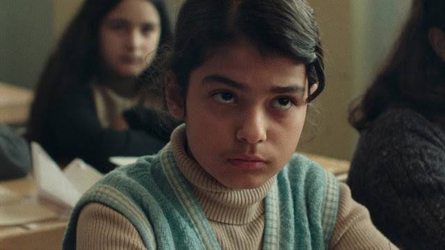 Negin (Rojina Esmaeili) doesn't appreciate his abusive teacher in Matthew Rankin's Universal Language (2024)