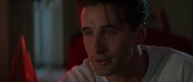 Zeke Hawkins (Billy Baldwin) gives off a creepy vibe in Phillip Noyce's Sliver (1993)