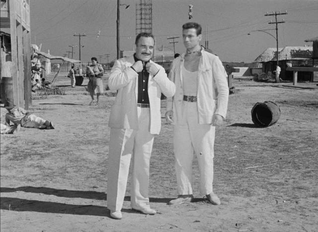 Mario (Yves Montand) is drawn to M. Jo (Charles Vanel)'s confidence in Henri-Georges Clouzot’s The Wages of Fear (1953)