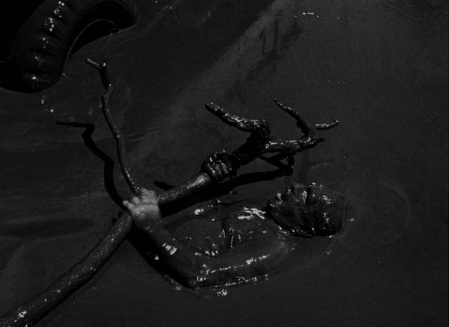 M. Jo (Charles Vanel) falls under the wheels of the truck in Henri-Georges Clouzot’s The Wages of Fear (1953)